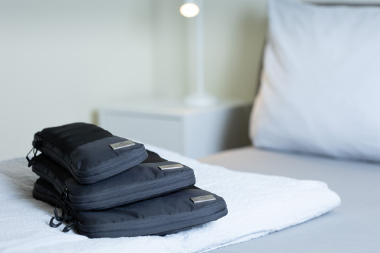 TROIKA Reise-Kompressionstaschen Set BLUE CYCLE PACKING CUBES