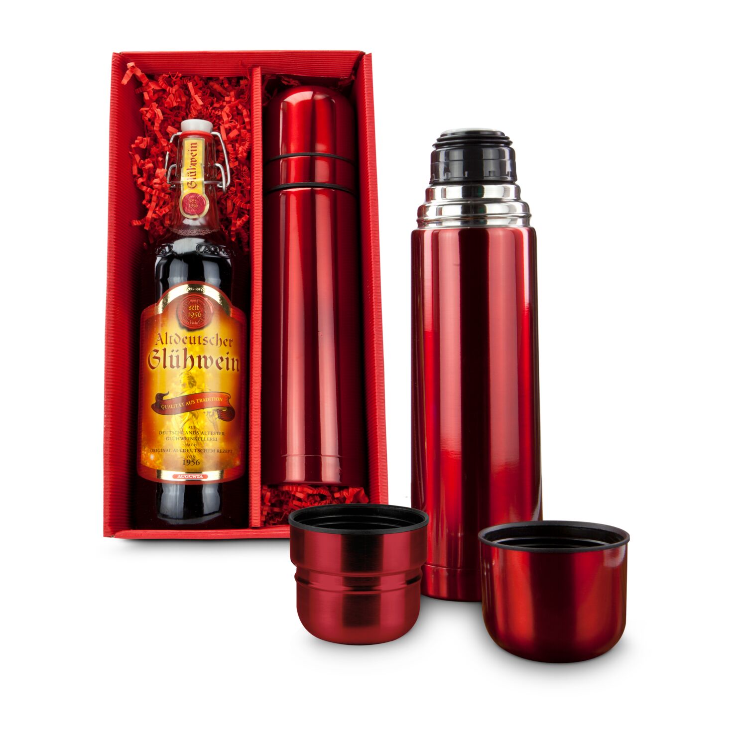 Rot in Rot: Eine rote ROMINOX® Isolierkanne mit 2 Bechern (0,75 l) und einer Flasche Altdeutschem Glühwein (1 l) im roten Geschenkkarton.