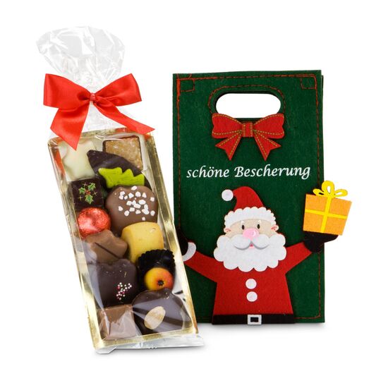 Eine „Schöne Bescherung” in der Tüte: 125 g gemischtes Confiserie-Gebäck verpackt in einer fröhlichen Filztasche mit 3D Weihnachtsmann.