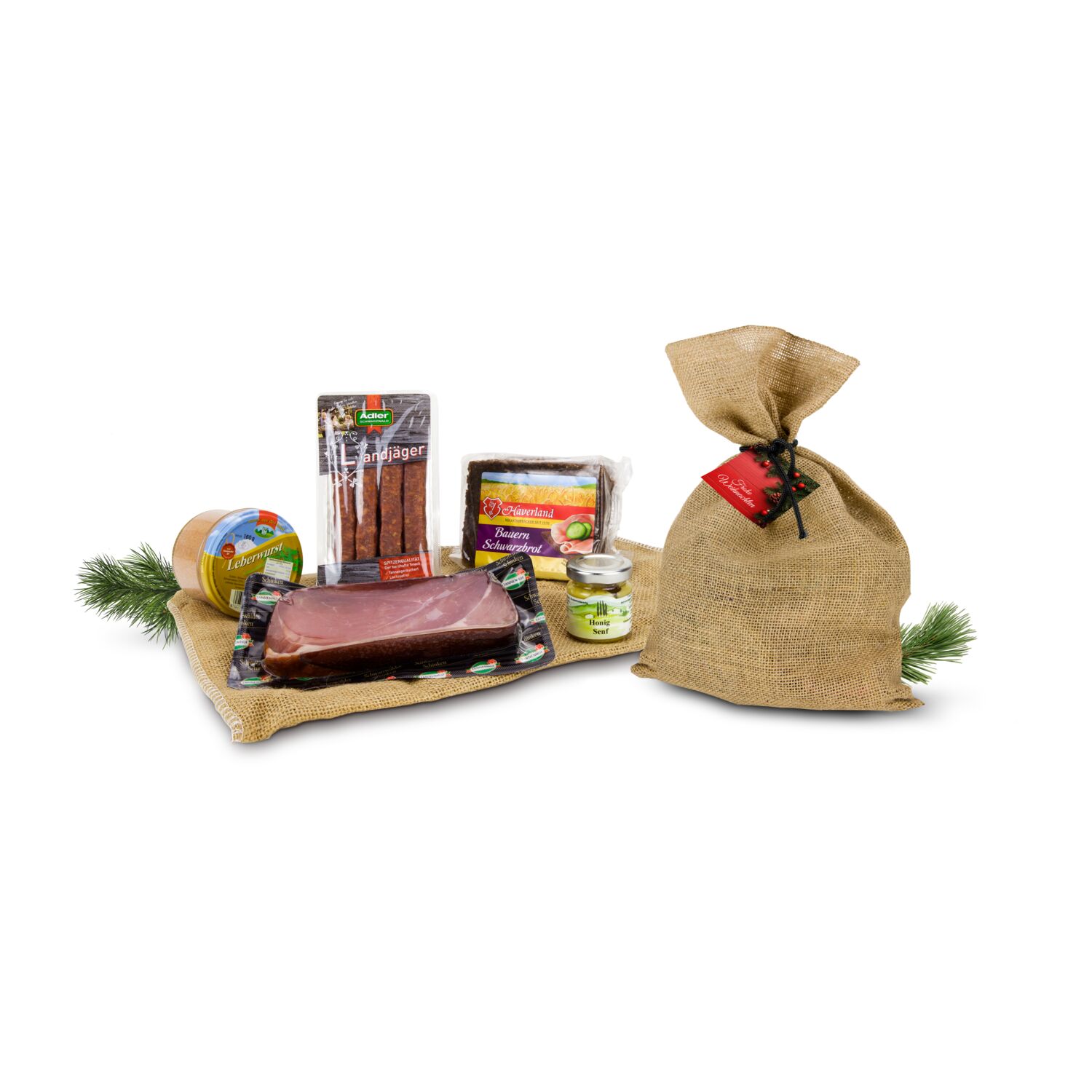 Schwarzwälder Schinken, 1 Glas Leberwurst, 4 Landjäger, dazu Senf und Vollkornbrot verpackt im Jutesack mit weihnachtlichem Anhänger.