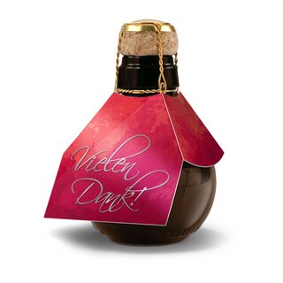 0,125 l hochwertiger Sekt brut in origineller Flasche mit Naturkork und Agraffe, Alkohol 12% Vol.