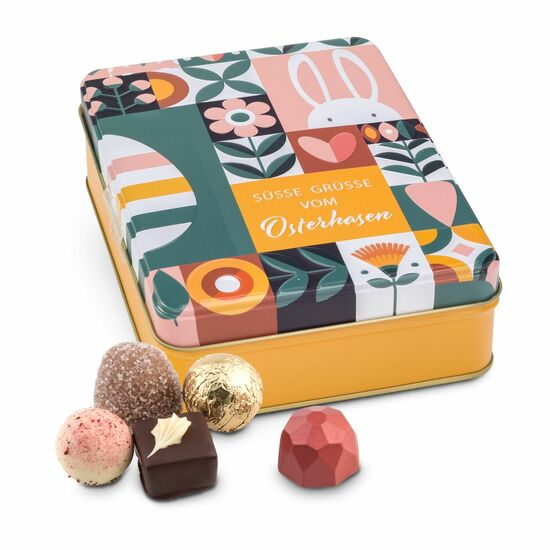 125 g Pralinen & Trüffel in einer bunten, österlichen Schmuckdose mit 3D-Prägung. Damit machen Sie großen & kleinen Osterhasen eine Freude!