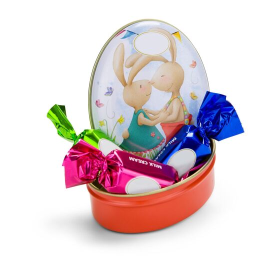 Metalldose mit 3 Schokoladen-Pralinen mit Milchcremefüllung (insgesamt 32 g). Motive sortiert.