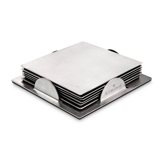 Eine Flasche Rotwein Sangiovese (0,75 l), ein 4er Set ROMINOX® Schiefer Glasuntersetzer und ein 4er Set ROMINOX® Edelstahl Serviettenringe.