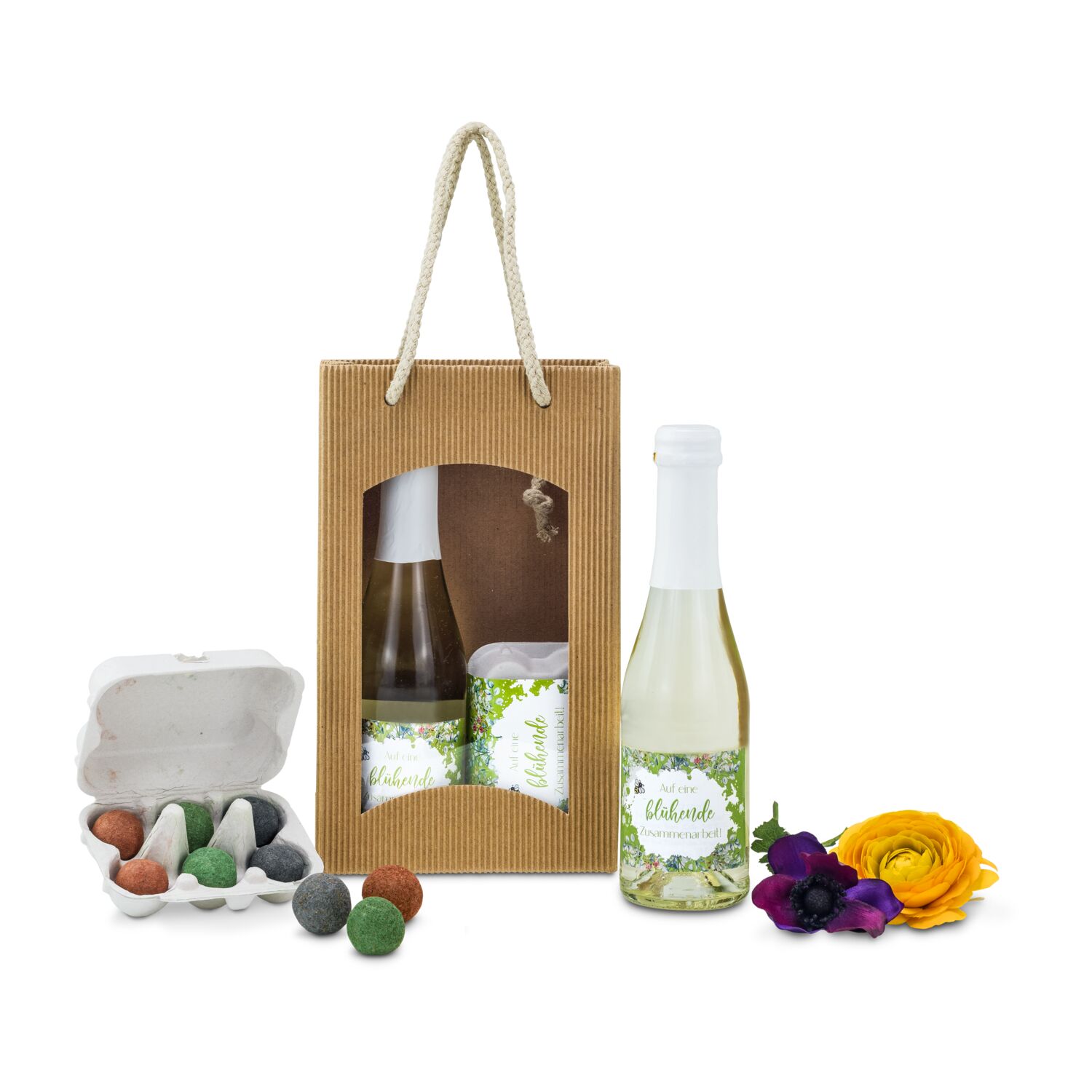 Ein leckerer Piccolo Secco (0,2 l) und eine Eierschachtel mit 6 bunten Blumenmurmeln. Einfach auf die Erde auswerfen & auf den Regen warten.