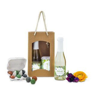 Ein leckerer Piccolo Secco (0,2 l) und eine Eierschachtel mit 6 bunten Blumenmurmeln. Einfach auf die Erde auswerfen & auf den Regen warten.