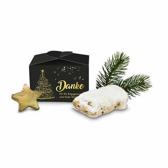 Ein 80 g Mini-Stollen in einer Pralinenverpackung mit „Danke und frohe Weihnachten” Aufdruck.