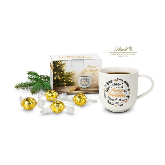 Festlicher Porzellanbecher (350 ml) mit goldener „Merry Christmas” Aufschrift gefüllt mit 4 Lindt Lindorkugeln (je 12,5 g)