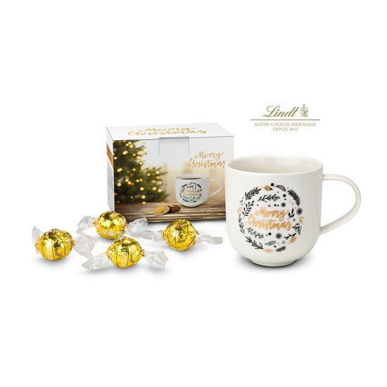Festlicher Porzellanbecher (350 ml) mit goldener „Merry Christmas” Aufschrift gefüllt mit 4 Lindt Lindorkugeln (je 12,5 g)