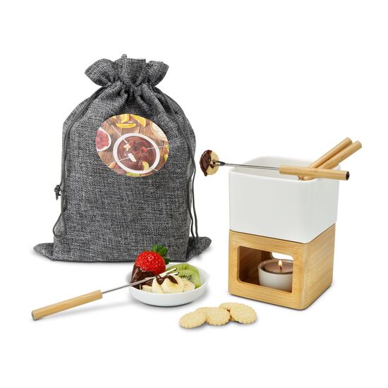 ROMINOX® Schokoladenfondue Dolce, dazu Schokodrops und leckere Mini-Butterkekse - verpackt im großen grauen Jutesack.