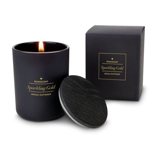 Die Tüte ist gefüllt mit "Du bist Gold wert" Secco (0,2 L), 3 goldenen Lindt Lindor Kugeln und einer ROMOSCENT® Sparkling Gold Duftkerze.