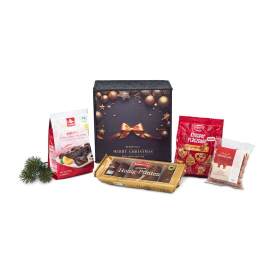 In diesem ROMINOX® Filzkorb befinden sich Honig-Saftprinten, Mini Plätzchen, Lebkuchen Herzen und dragierte Erdnüsse.
