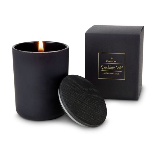 Elegante Kerze in matt-schwarzem Glas mit Goldaufdruck, mit Deckel und Schleife in einem kleinen Geschenkkarton